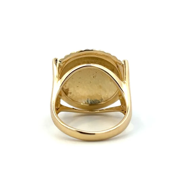 Estate Flower Button Ring in 14K yellow gold with a floral pattern and rope-textured frame.