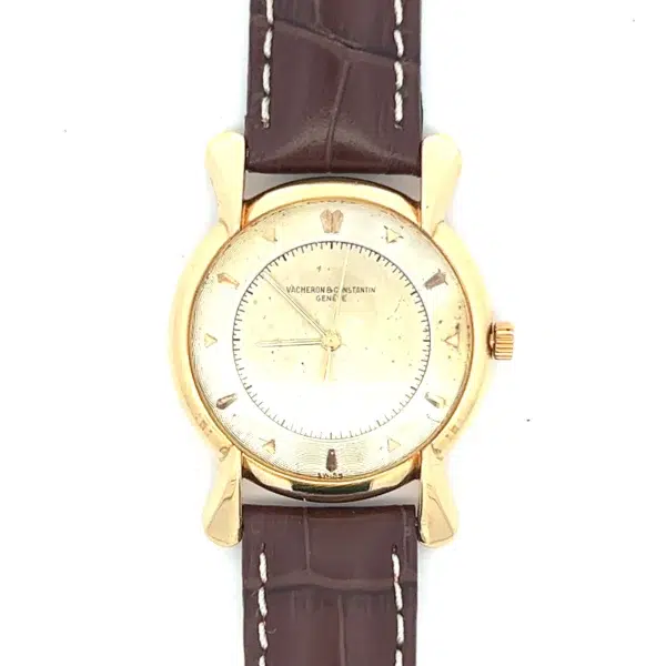 Estate 18K Gold Vacheron Constantin Watch with brown leather strap, round case, and minimalist geometric hour markers.