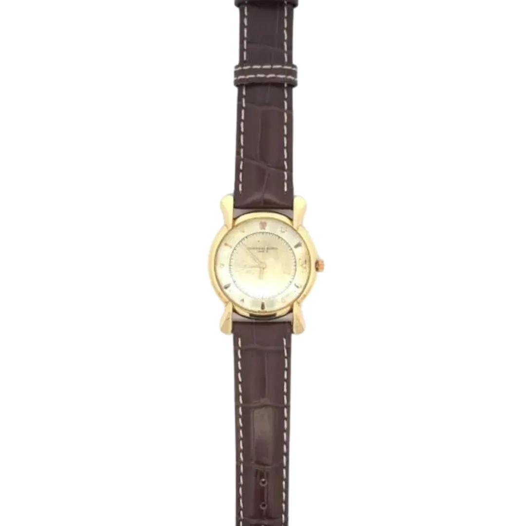 Estate 18K Gold Vacheron Constantin Watch with brown leather strap, round case, and minimalist geometric hour markers.